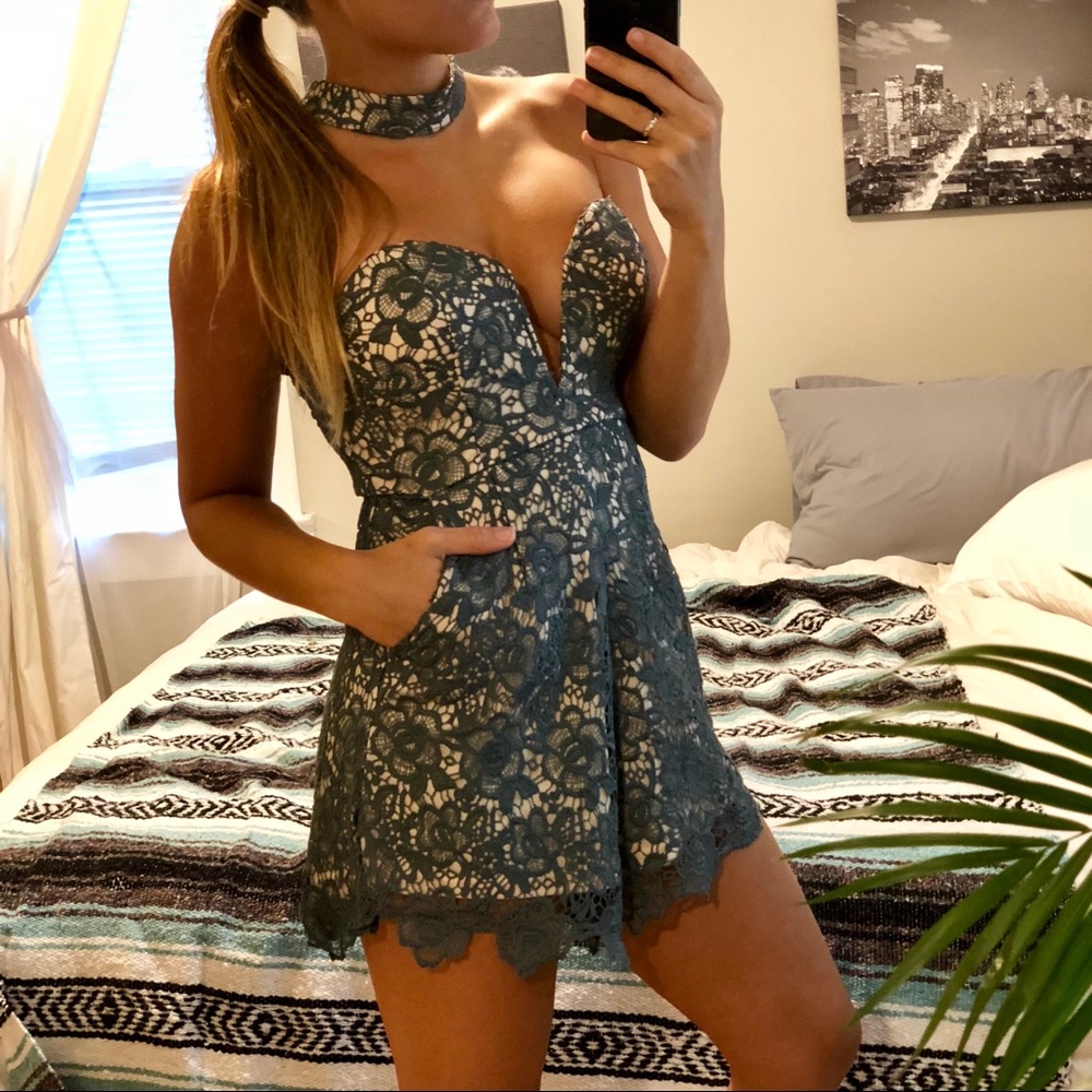 Romantic NWT romper with side pocket detailing